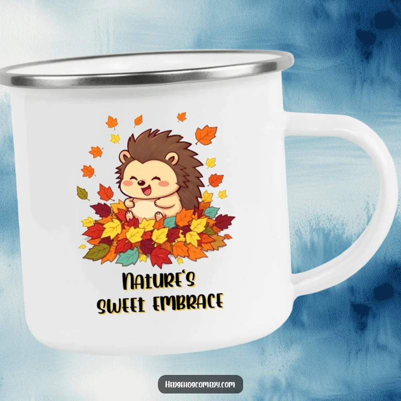 Durable funny camping mug with a happy hedgehog rolling in colorful autumn leaves, perfect for outdoor fall activities and warmth.