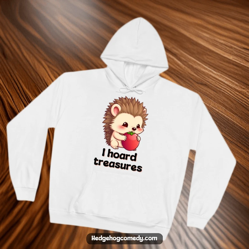 Funny hoodie featuring a timid hedgehog holding a large berry under its chin.