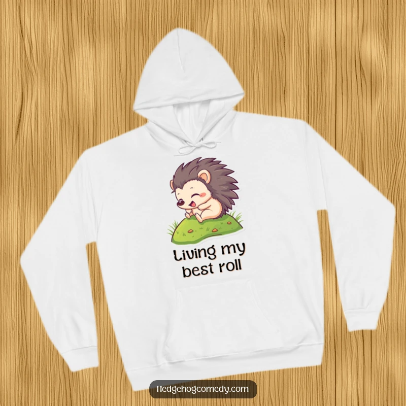 Funny Hoodie: Adorable hedgehog in mid-roll down a sunlit hill, capturing pure carefree bliss. A must-have for cozy laughs.