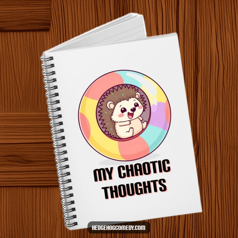 Funny Notebook cover design: a happy Kawaii hedgehog excitedly rolling inside a large, colorful sphere.