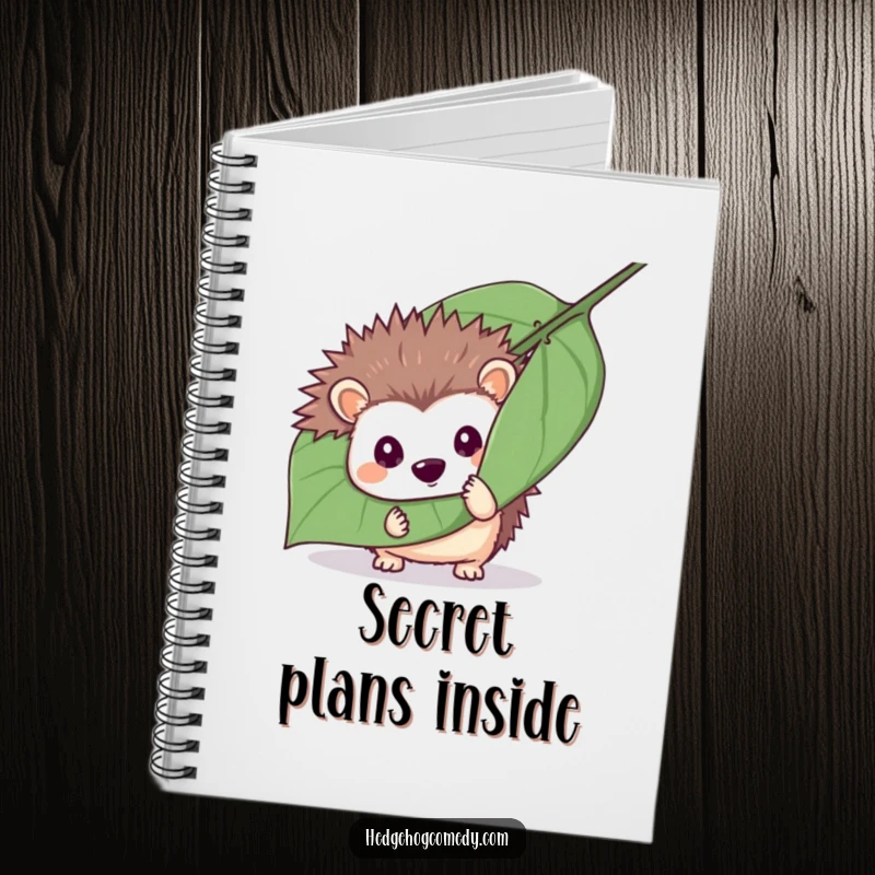 Funny mischievous hedgehog hiding behind a leaf on a notebook, perfect for jotting down secrets and as a funny gift.