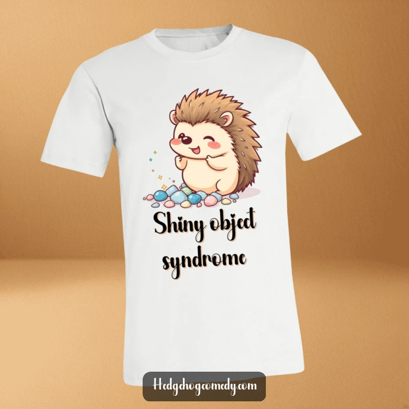 Funny Kawaii Hedgehog T-Shirt: An excited hedgehog proudly presents a pile of tiny, sparkling pebbles, showcasing its collection with glee.