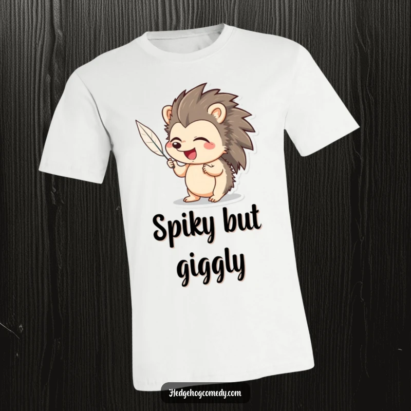 Funny Hedgehog T-Shirt: An adorable hedgehog giggling while a feather tickles its nose, radiating pure delight.